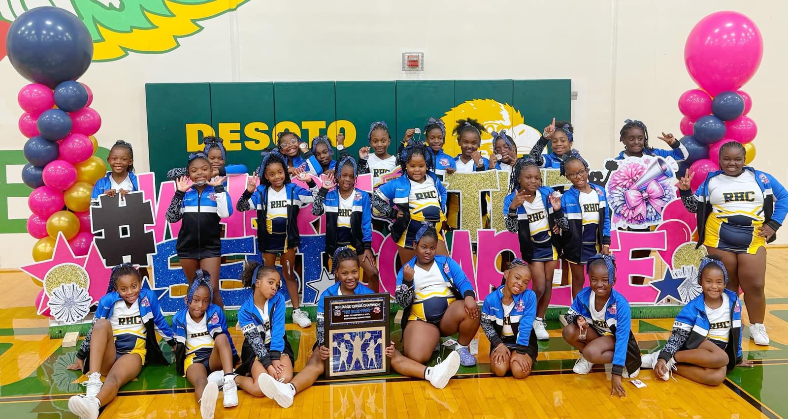 RHC cheer team with championship plaque